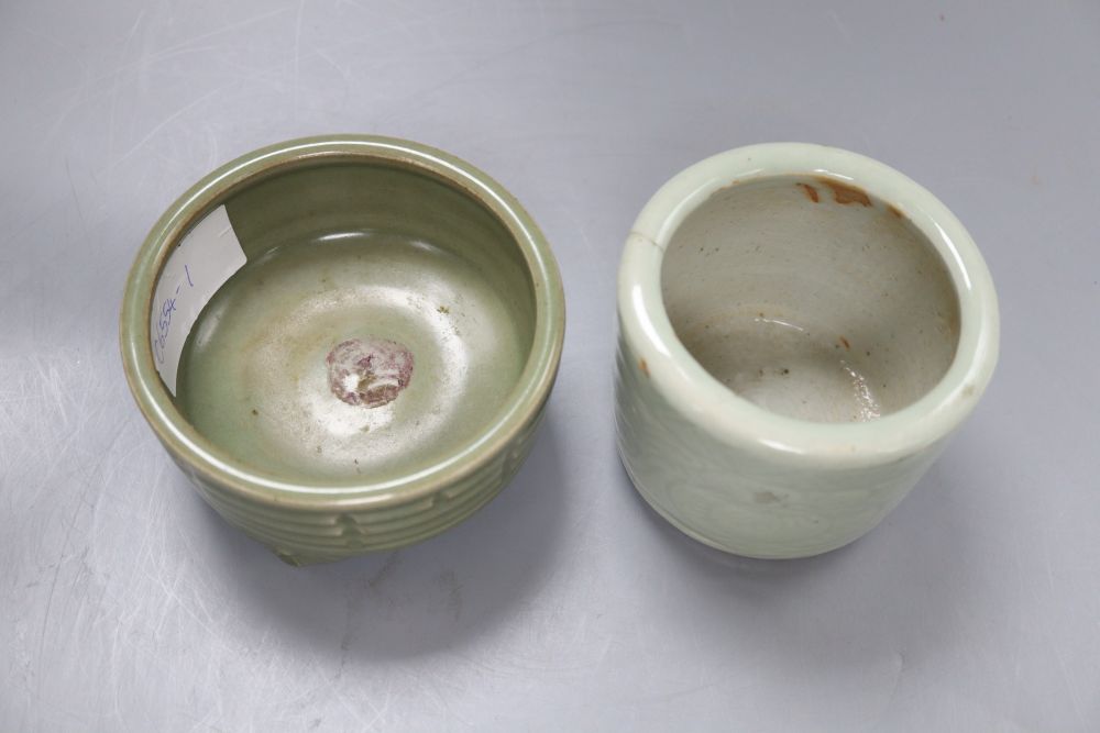 A Chinese celadon glazed tripod brushwasher and another, tallest 8cm